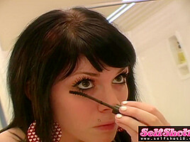 Pretty teen 18+ does her eye make up