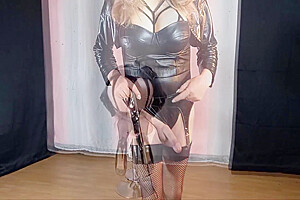 Pvc Wearing Tranny Indoors Posing And Wanking