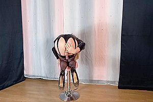 Pvc Wearing Tranny Indoors Posing And Wanking