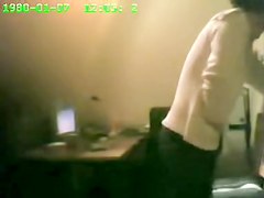 Raunchy security cam masturbation from the office cutie