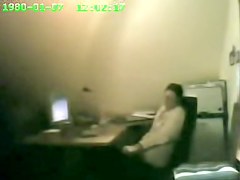 Raunchy security cam masturbation from the office cutie