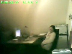 Raunchy security cam masturbation from the office cutie