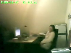 Raunchy security cam masturbation from the office cutie