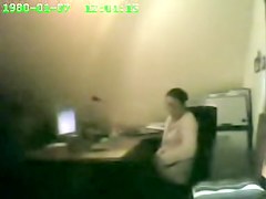 Raunchy security cam masturbation from the office cutie