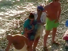 Real swingers at a nudist beach