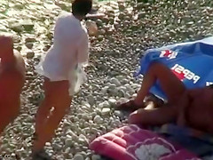 Real swingers at a nudist beach