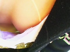 Red haired Japanese girl tricked into showing her cleveage