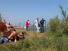 Redhead slave fucked at river view