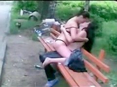 Russian hookers in underwear hook up on a public bench