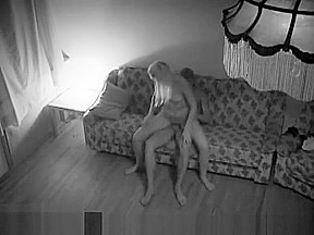 Sex on a sofa captured by a camera