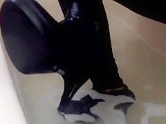 Sexy tight pants ankle boots and heels in bath