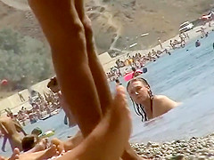 Sexy topless babe in a thong bikini