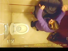 Short hair mature woman taking a pee