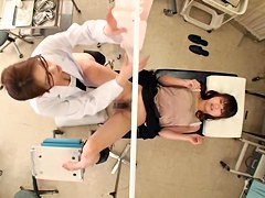Skinny Jap babe gets banged with a dildo during Gyno exam