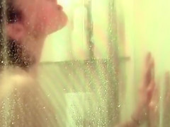 Skinny young lady takes a morning shower