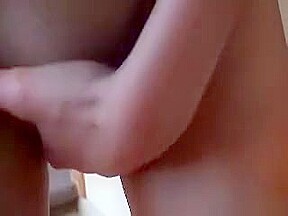 Slim babe rubs her juicy clit