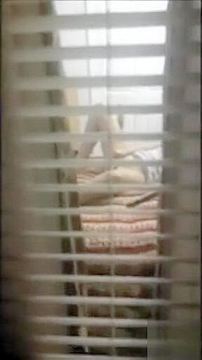 Spying my mum masturbating on bed