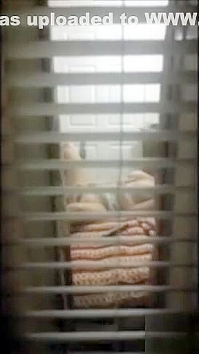 Spying my mum masturbating on bed