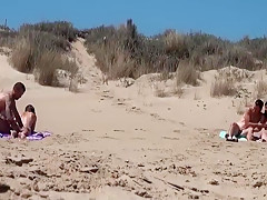Sunbathing At Naked Beach With Two Couple Sex