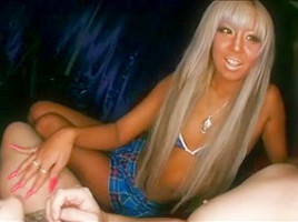 Tan asian with longs nails gives handjob on couch
