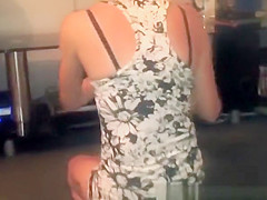 Tattooed wife cleaning the dust