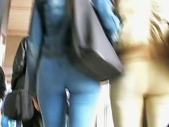 Tempting behinds captured in a street candid video