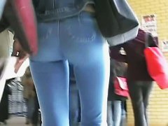 Tempting behinds captured in a street candid video