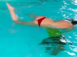 The girls take a swim and wrestle in the pool ( 1)