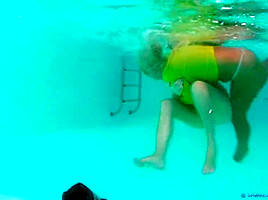 The girls take a swim and wrestle in the pool ( 1)