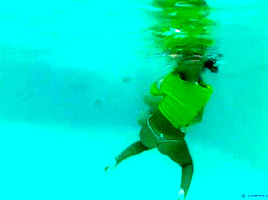 The girls take a swim and wrestle in the pool ( 1)