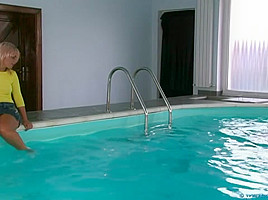 The girls take a swim and wrestle in the pool ( 1)