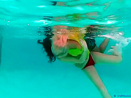 The girls take a swim and wrestle in the pool ( 1)