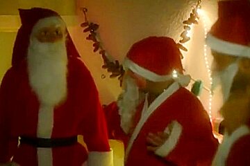 Three Santa's straponed and fisted