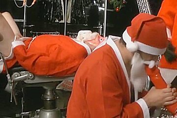 Three Santa's straponed and fisted