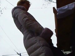 Three skinny bitches in knee-high boots get filmed in an upskirt video