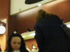 Three skinny bitches in knee-high boots get filmed in an upskirt video