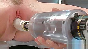 Tied up slut drilled by sex machines in the BDSM video