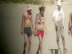Topless girl caught by