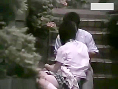 Two couples making love outside