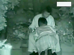 Two couples making love outside