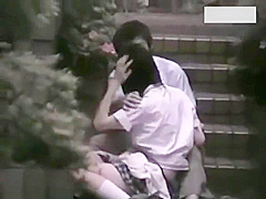 Two couples making love outside