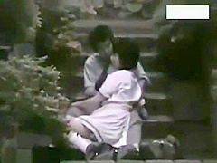 Two couples making love outside