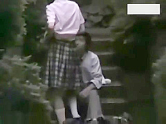 Two couples making love outside