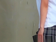 Two girls get caught pissing and filming each other outside
