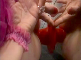Two hot babes in a pretty kinky femdom video