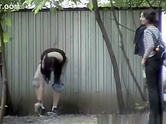 Two teen 18+ caught by peeing