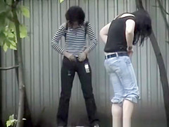 Two teen 18+ caught by peeing
