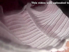 Upskirt of a polite looking woman