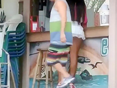 Upskirt of mulatto street prostitute