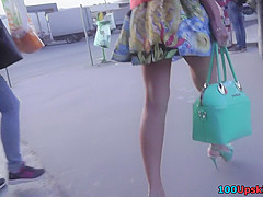 Upskirt vid made in public shows redhead in g-string
